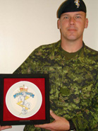 Cpl Pike VERY proudly displaying his promotion gift